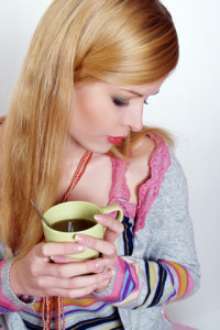 http://www.dreamstime.com/royalty-free-stock-photos-girl-drinking-hot-coffee-tea-image12568118